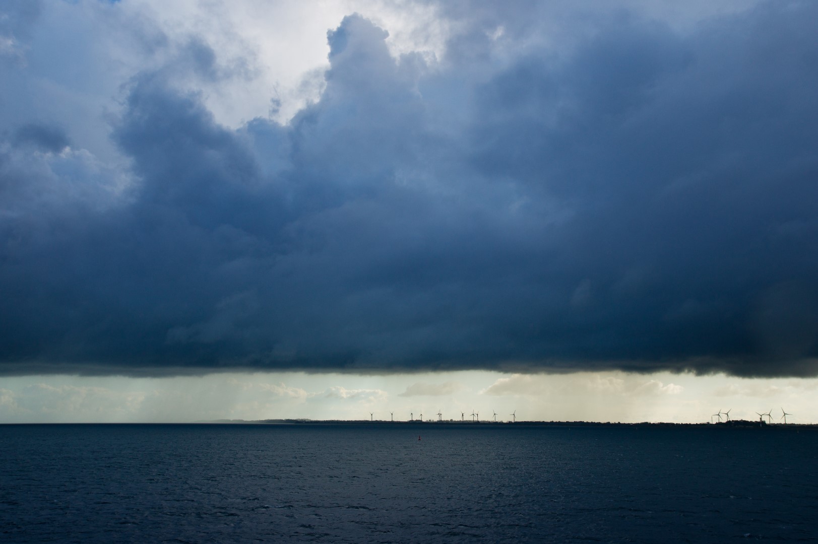 Wind turbines along the horizon